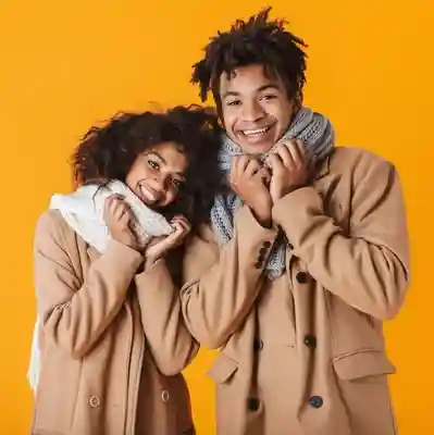 A man and woman posing for the camera.