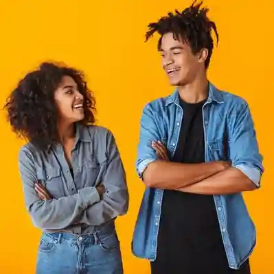 A man and woman standing next to each other.